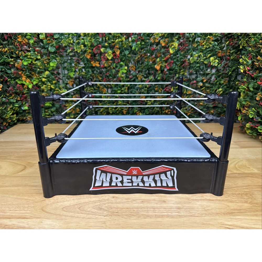WWE WWF MATTEL Wrekkin Wrestling Ring  Spring Loaded 2010 with Decals Toy Figure